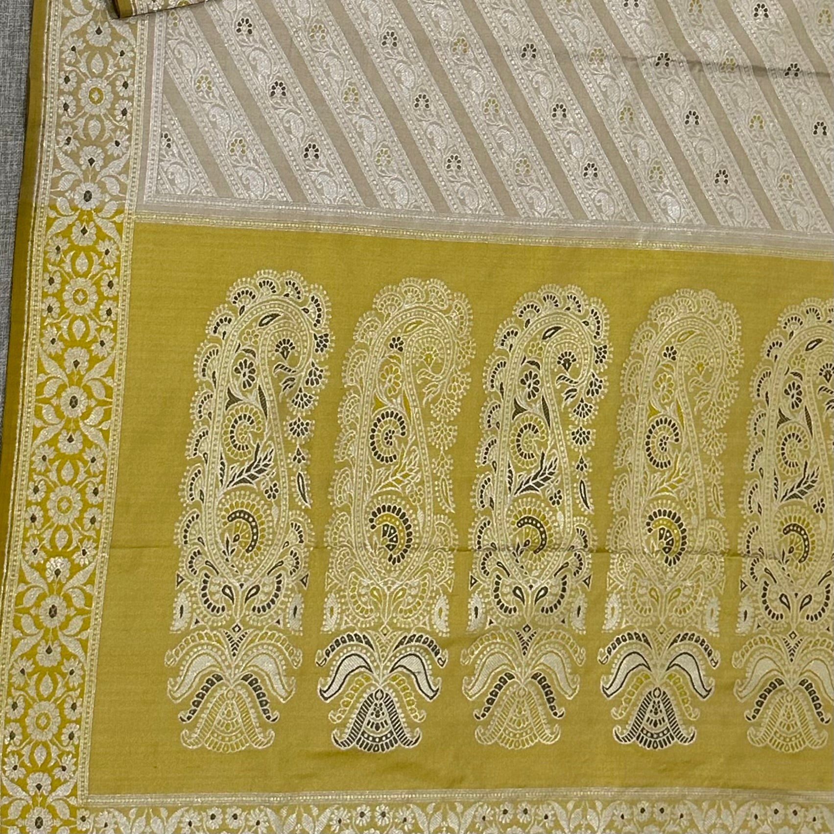 Beige and Yellow Ada Baluchari Saree with Paisleys in the Palla