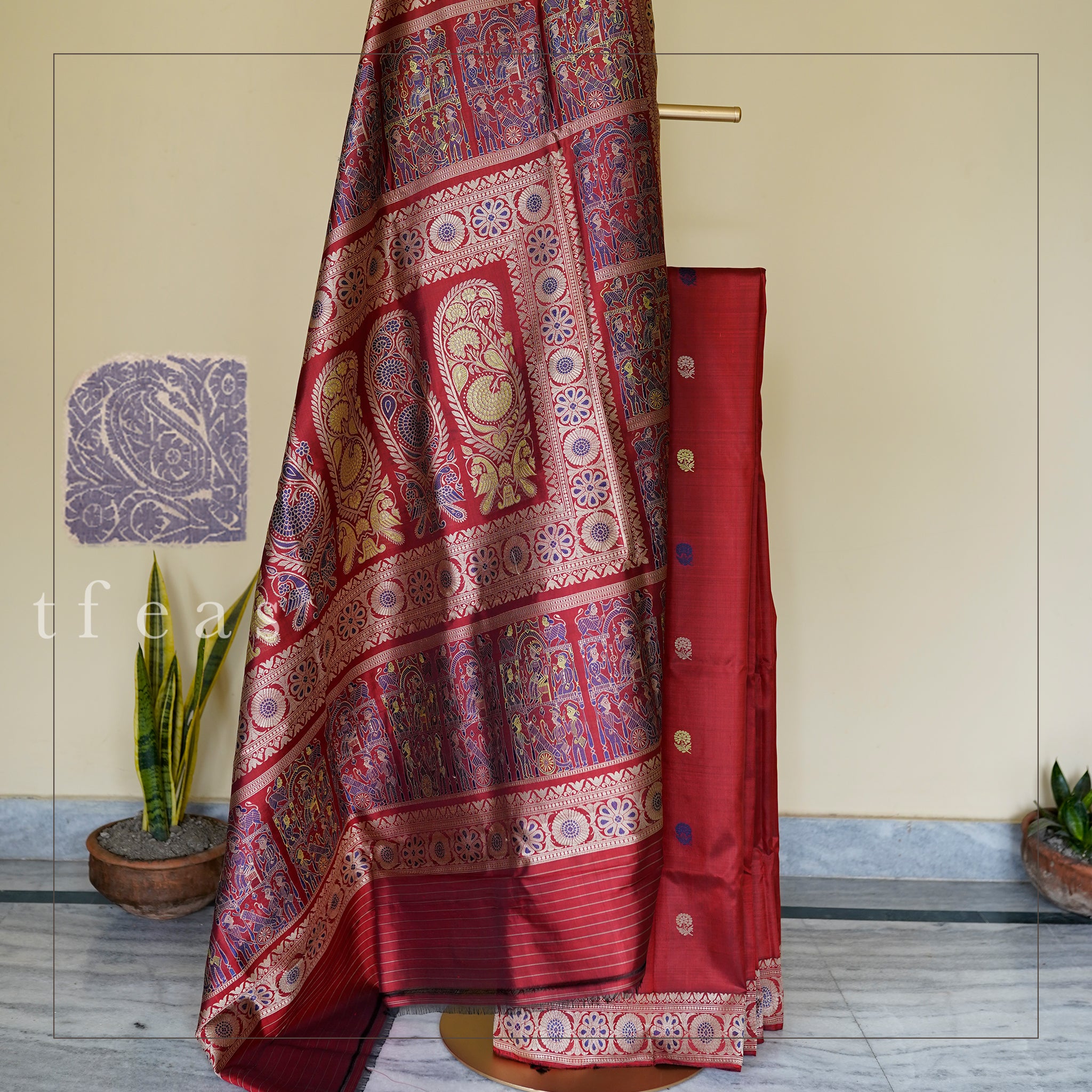 Rust and Blue Baluchari Saree with a Grand Palla