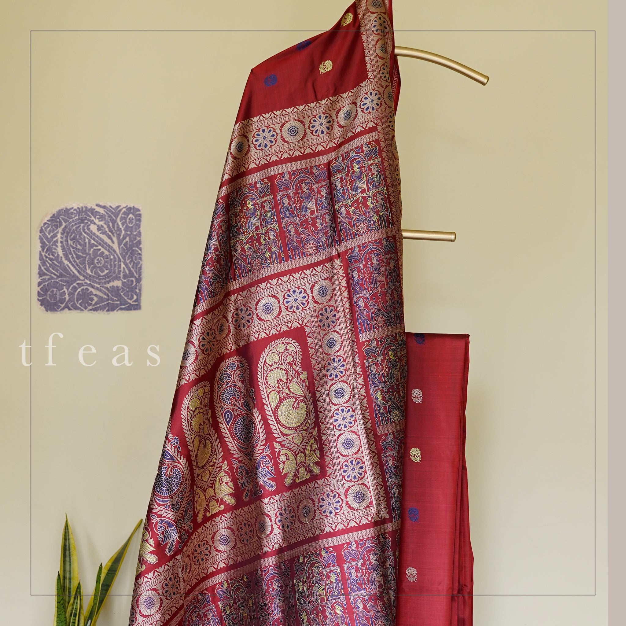 Rust and Blue Baluchari Saree with a Grand Palla