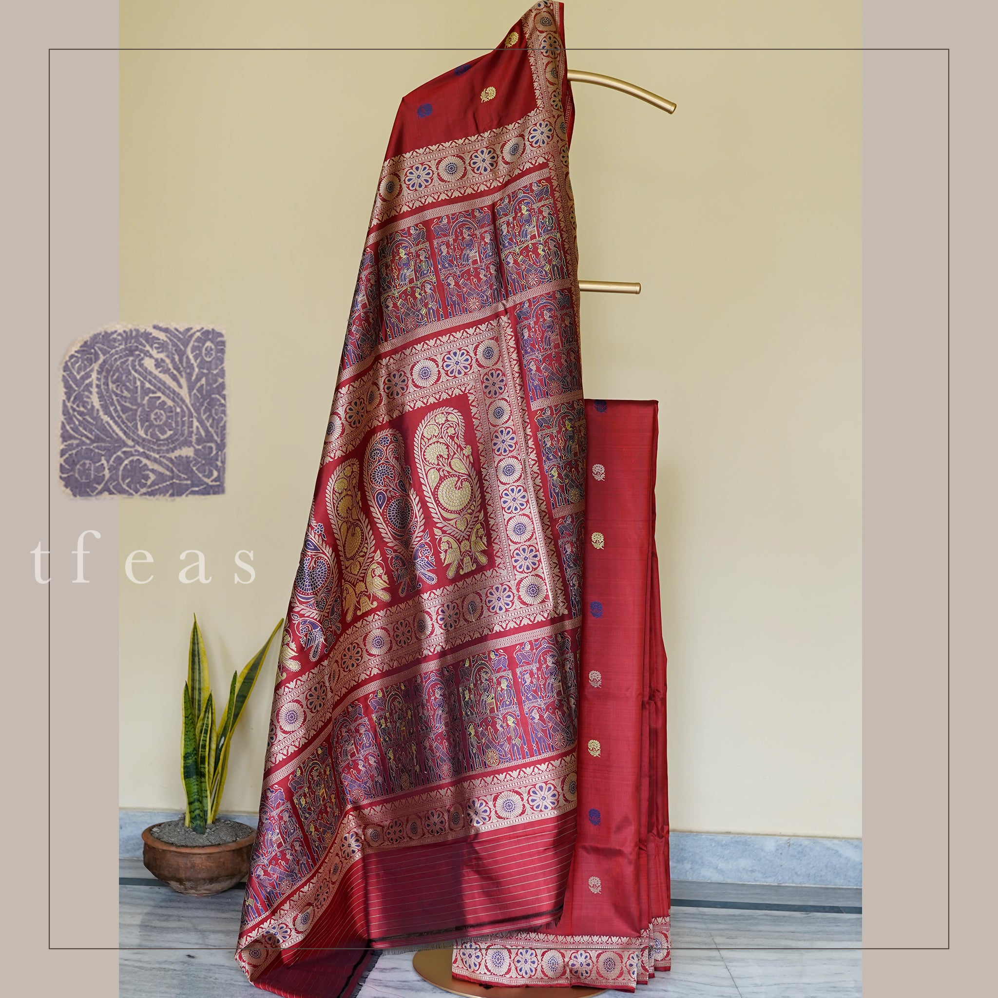 Rust and Blue Baluchari Saree with a Grand Palla