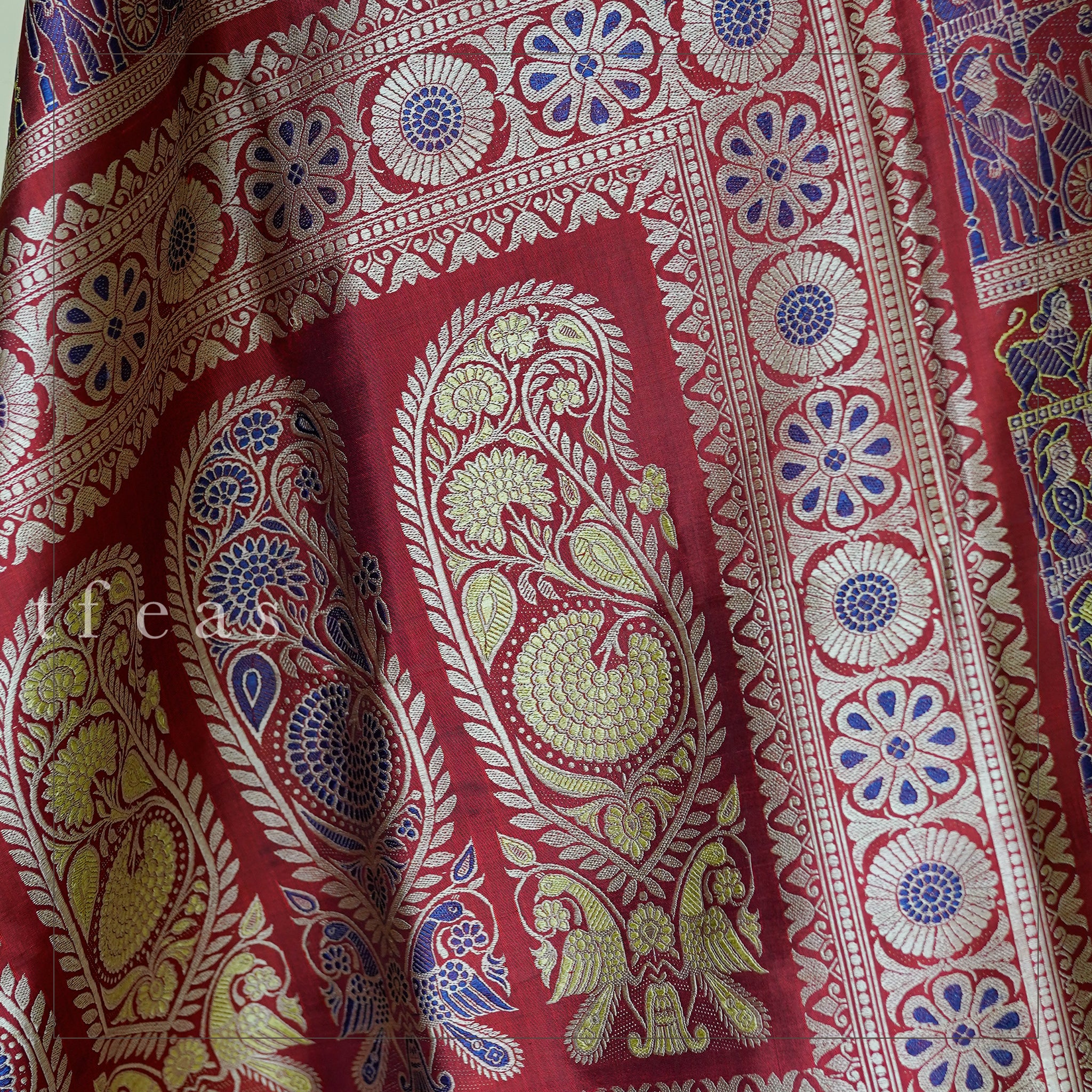 Rust and Blue Baluchari Saree with a Grand Palla