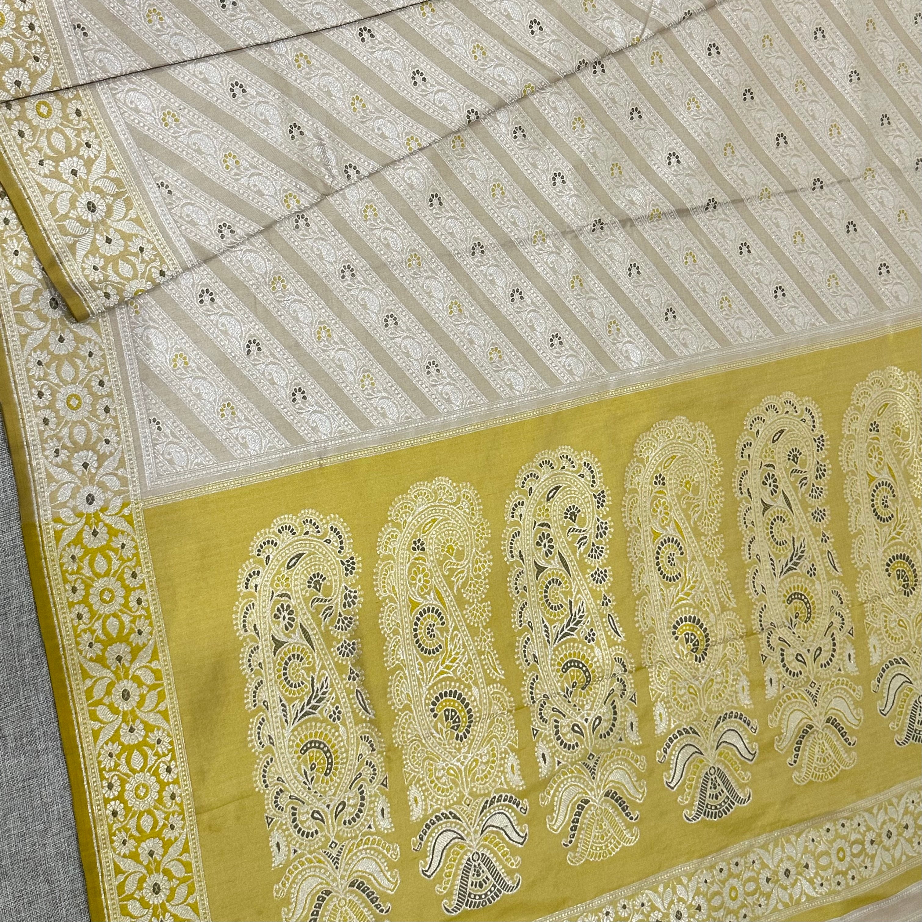Beige and Yellow Ada Baluchari Saree with Paisleys in the Palla