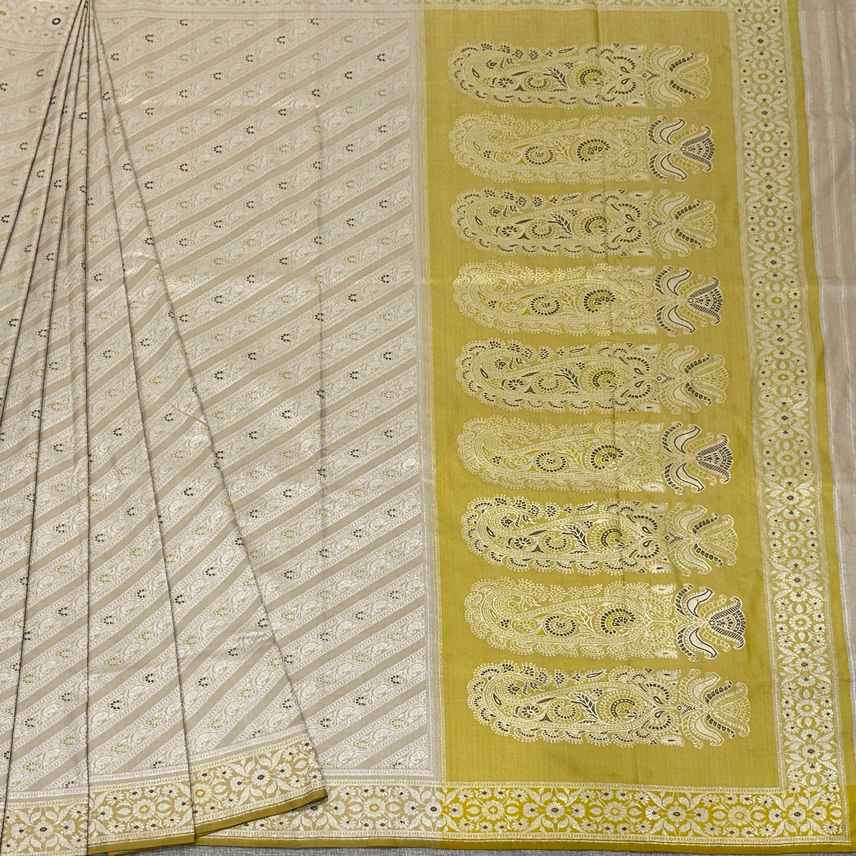 Beige and Yellow Ada Baluchari Saree with Paisleys in the Palla