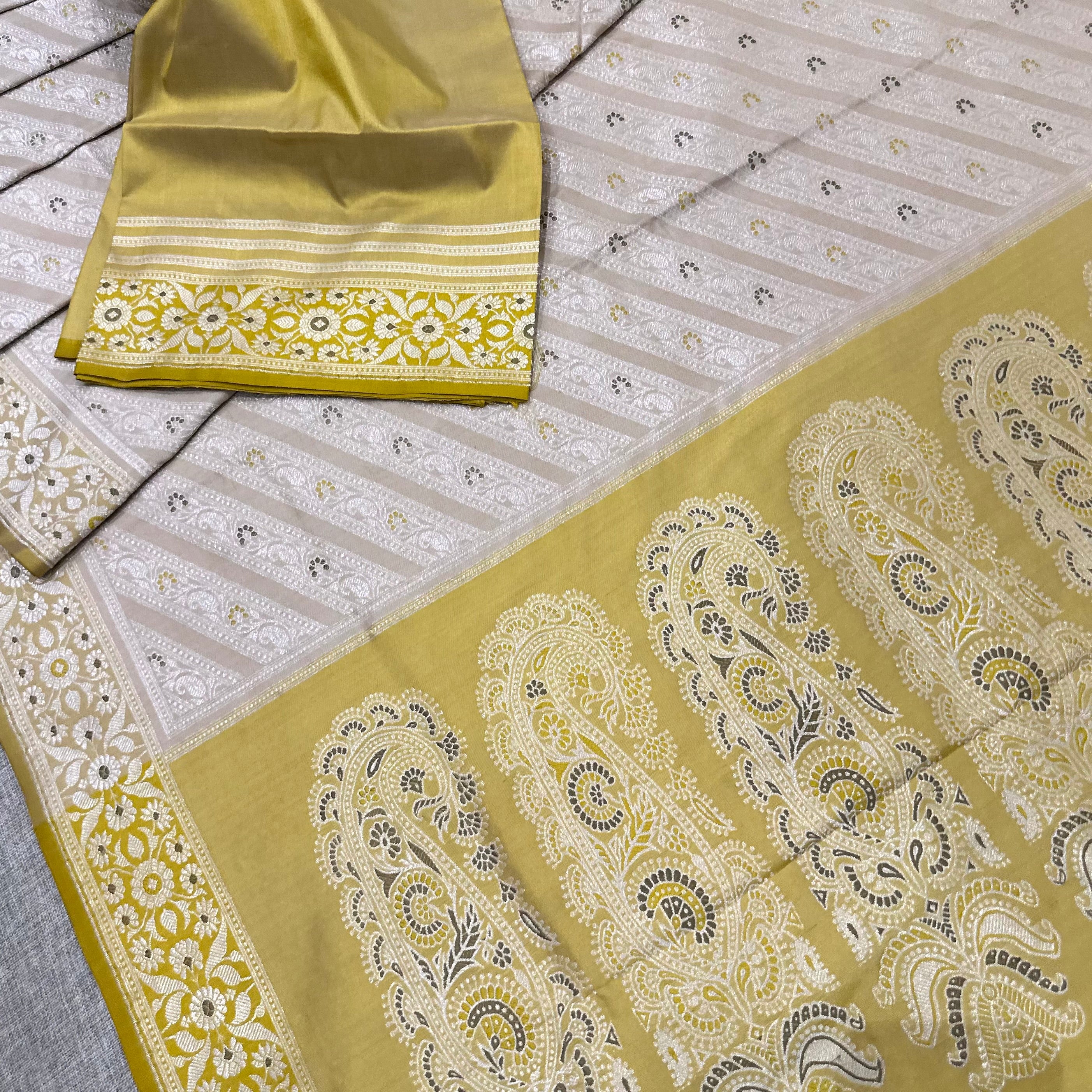 Beige and Yellow Ada Baluchari Saree with Paisleys in the Palla