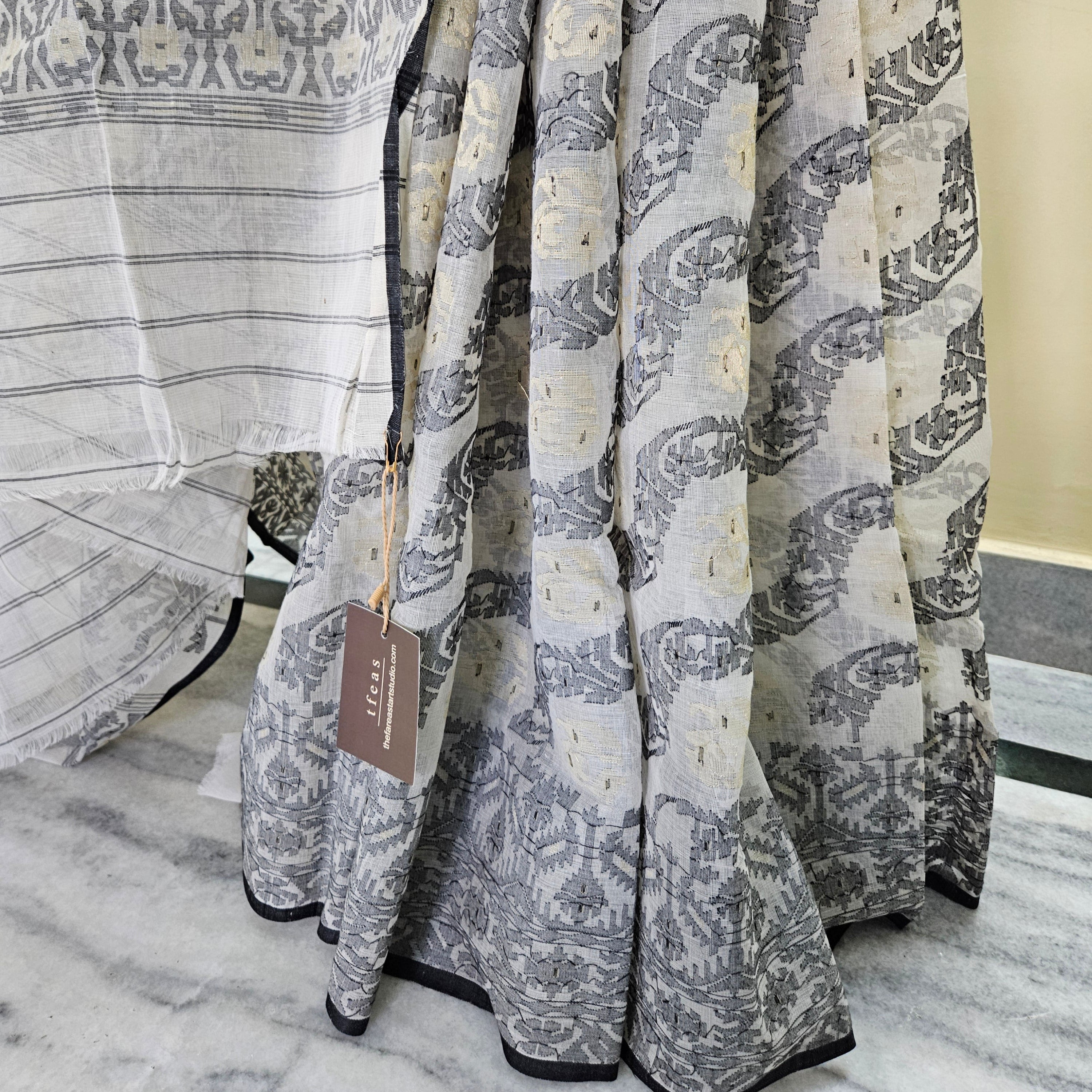 200 count khadi white and black dhakai jamdani with floral palla