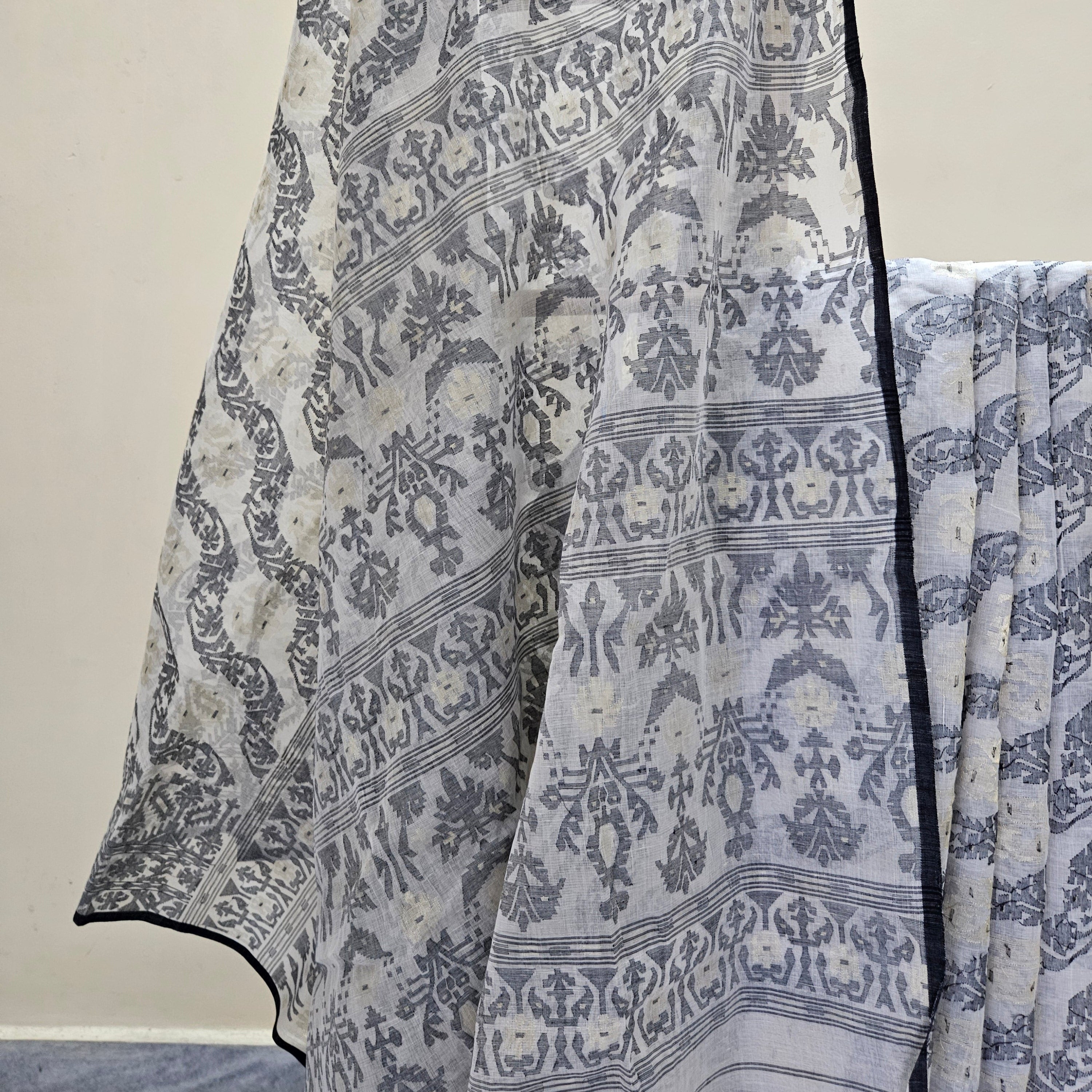 200 count khadi white and black dhakai jamdani with floral palla