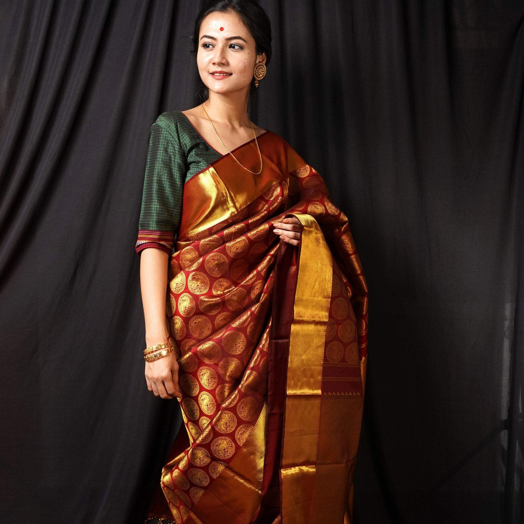 Handwoven Maroon and Gold Kanjeevaram Silk Saree